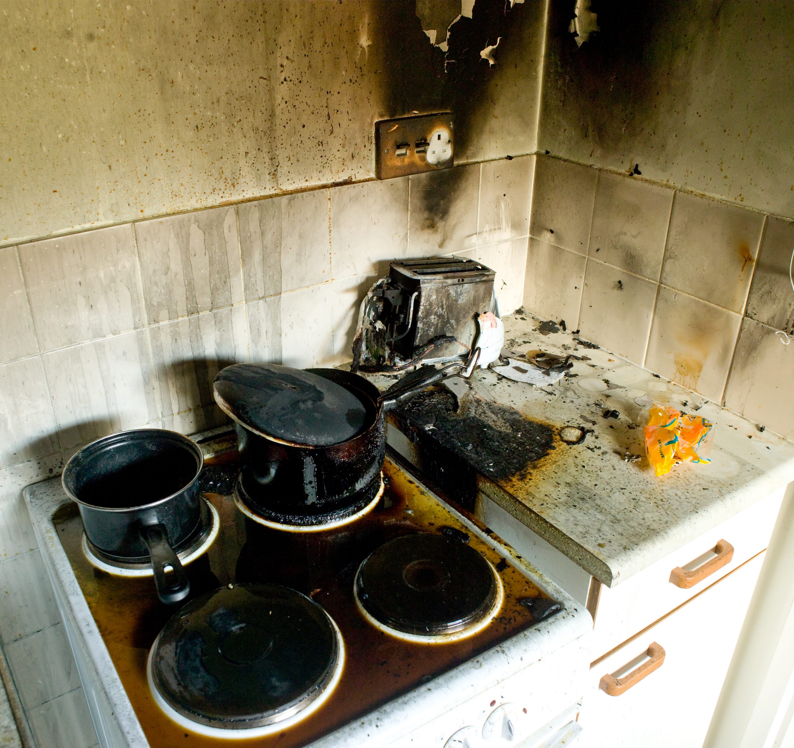 fire damage in kitchen, Fire Watch Company, Fire Watch Patrol, Fire Watch Security, Fire Watch Services, Daytona Beach, Fire Safety, NFPA 101, Compliance, Emergency Services